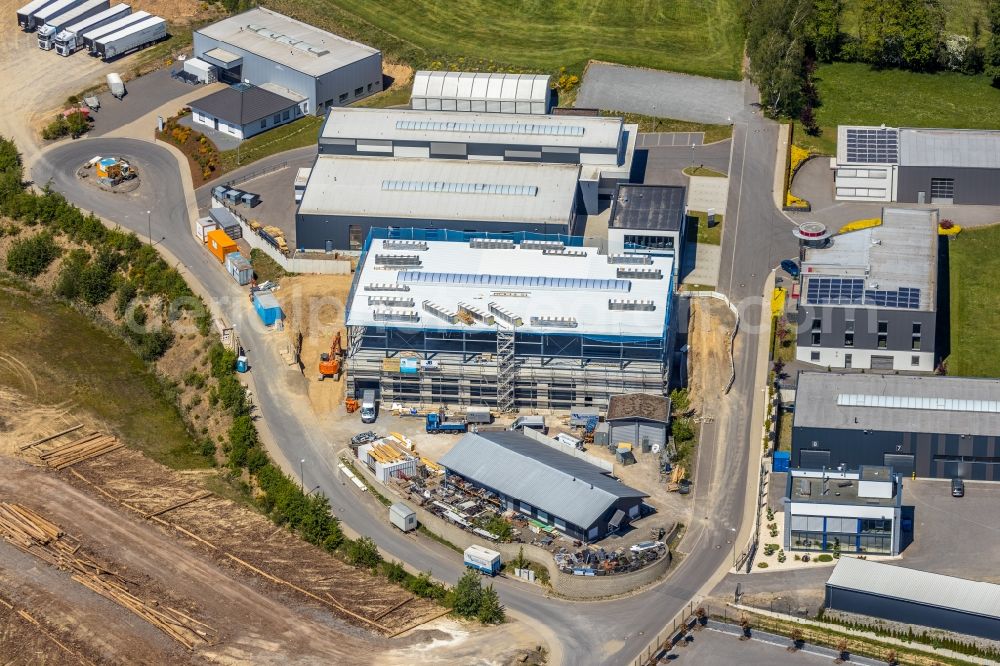 Aerial image Kirchhundem - Extension - new building - construction site on the factory premises of HYDROPHON Kunststofftechnik GmbH Zum Eulenbruch in Kirchhundem in the state North Rhine-Westphalia, Germany