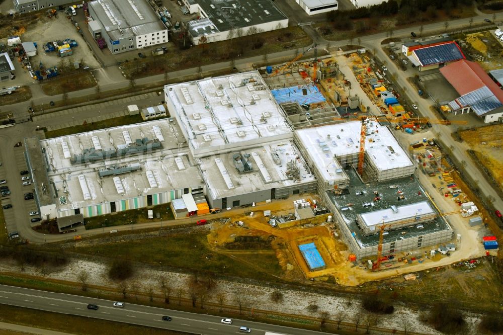 Aichach from the bird's eye view: Extension - new building - construction site on the factory premises of Julius Zorn GmbH on Industriestrasse - Ludwig-Erhard-Strasse in Aichach in the state Bavaria, Germany