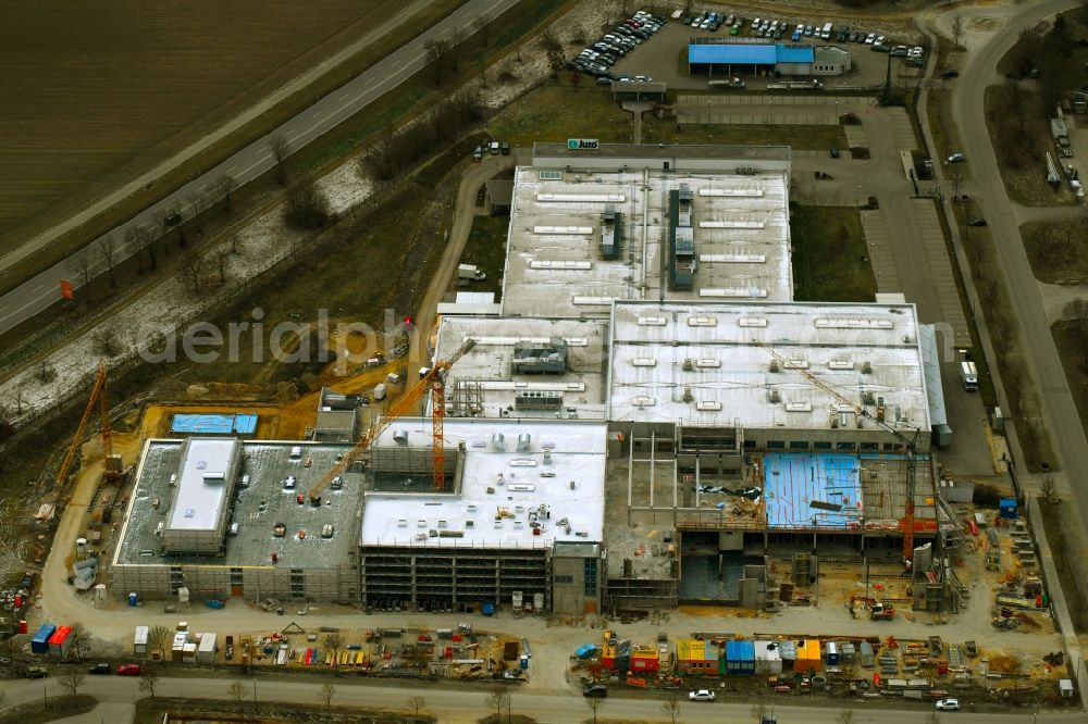 Aichach from the bird's eye view: Extension - new building - construction site on the factory premises of Julius Zorn GmbH on Industriestrasse - Ludwig-Erhard-Strasse in Aichach in the state Bavaria, Germany