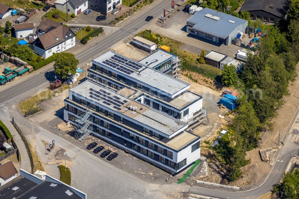 Kirchhundem from above - Extension - new building - construction site on the factory premises of MENNEKES Elektrotechnik GmbH & Co. KG in the district Welschen-Ennest in Kirchhundem in the state North Rhine-Westphalia, Germany