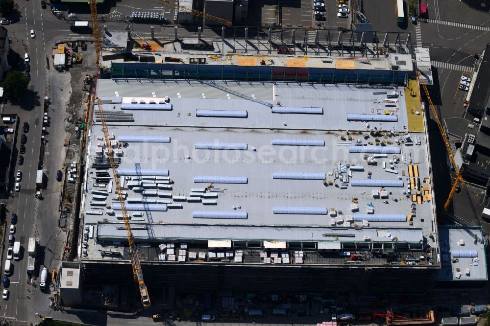 Stuttgart from the bird's eye view: Extension - new building - construction site on the factory premises of Porsche Deutschland GmbH on Adestrasse - Porschestrasse in the district Zuffenhausen in Stuttgart in the state Baden-Wurttemberg, Germany