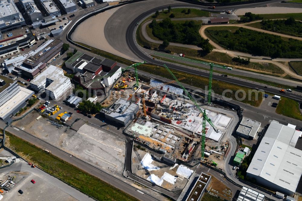 Weissach from the bird's eye view: Extension - new building - construction site on the factory premises of Porsche Deutschland GmbH in Weissach in the state Baden-Wurttemberg, Germany