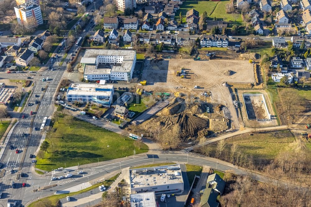 Hagen from the bird's eye view: Extension - new building - construction site on the factory premises des Sanitaetshaus Riepe GmbH & Co. KG on Hagener Strasse - Knippschildstrasse in Hagen at Ruhrgebiet in the state North Rhine-Westphalia, Germany