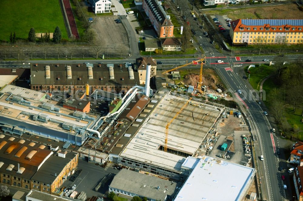 Aschaffenburg from the bird's eye view: Extension - new building - construction site on the factory premises of TRW Automotive Safety Systems GmbH on Spessartstrasse in Aschaffenburg in the state Bavaria, Germany