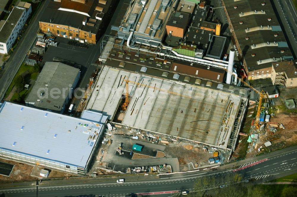 Aschaffenburg from the bird's eye view: Extension - new building - construction site on the factory premises of TRW Automotive Safety Systems GmbH on Spessartstrasse in Aschaffenburg in the state Bavaria, Germany