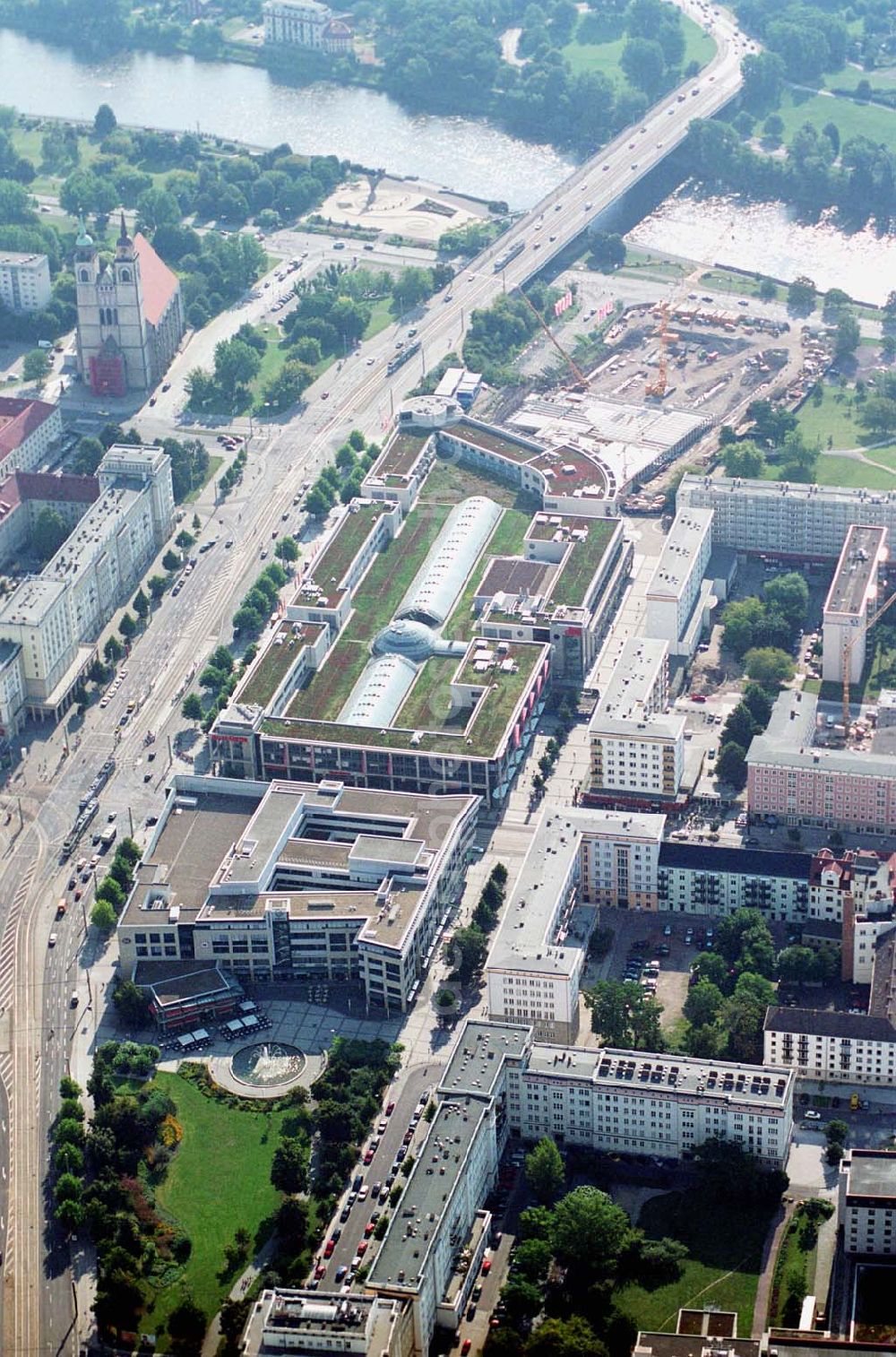 Aerial photograph Magdeburg(Sachsen-Anhalt) - Blick auf die Erweiterungsbaustelle am Allee-Center Magdeburg Ernst-Reuter-Allee 11,39104 Magdeburg,Tel.: 0391 / 533 44 33 Fax: 0391 / 533 44 55 (ECE)