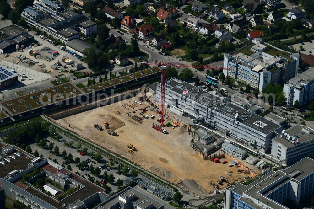 Unterföhring from above - Expansion site on the building complex of the transmitter New Campus of ProSieben Sat.1 Media SE on Medienallee - Gutenbergstrasse in Unterfoehring in the state Bavaria, Germany