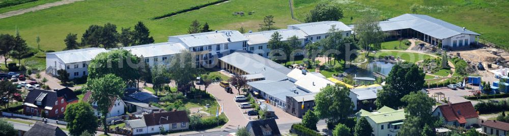 Aerial photograph Trassenheide - Erweiterungsbaustelle am Hotel und Restaurant Seeklause in Trassenheide auf der Insel Usedom in Mecklenburg - Vorpommern. Extension site at the hotel and restaurant in Seeklause Trassenheide on the island of Usedom in Mecklenburg - Western Pomerania.