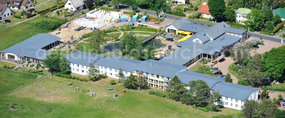 Aerial photograph Trassenheide - Erweiterungsbaustelle am Hotel und Restaurant Seeklause in Trassenheide auf der Insel Usedom in Mecklenburg - Vorpommern. Extension site at the hotel and restaurant in Seeklause Trassenheide on the island of Usedom in Mecklenburg - Western Pomerania.