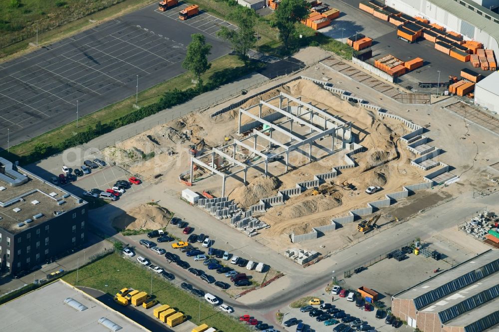 Aerial image Berlin - Construction site on building and production halls on the premises of Berliner Stadtreinigungsbetriebe on Gradestrasse in the district Britz in Berlin, Germany