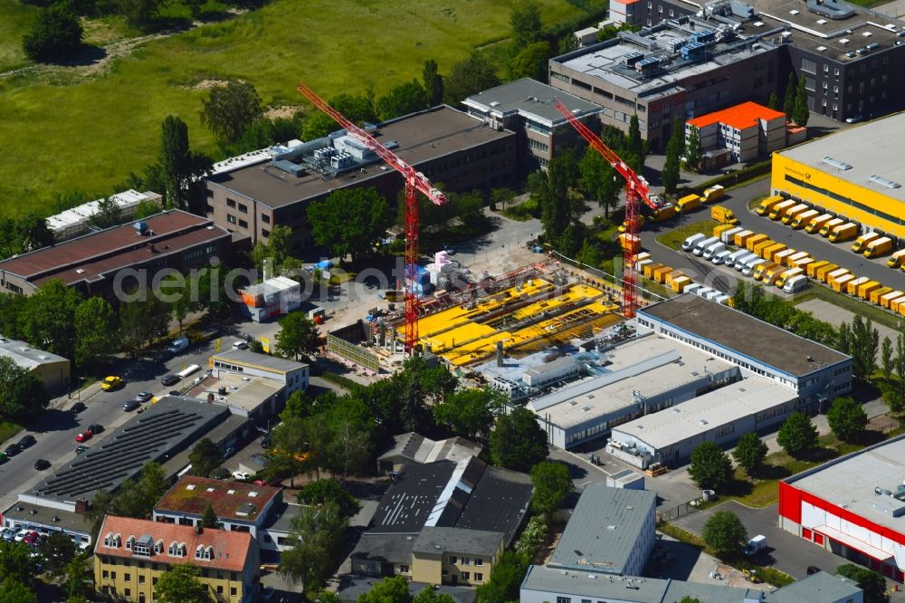 Aerial image Berlin - Construction site on building and production halls on the premises of Berliner Stadtreinigungsbetriebe on Gradestrasse in the district Britz in Berlin, Germany