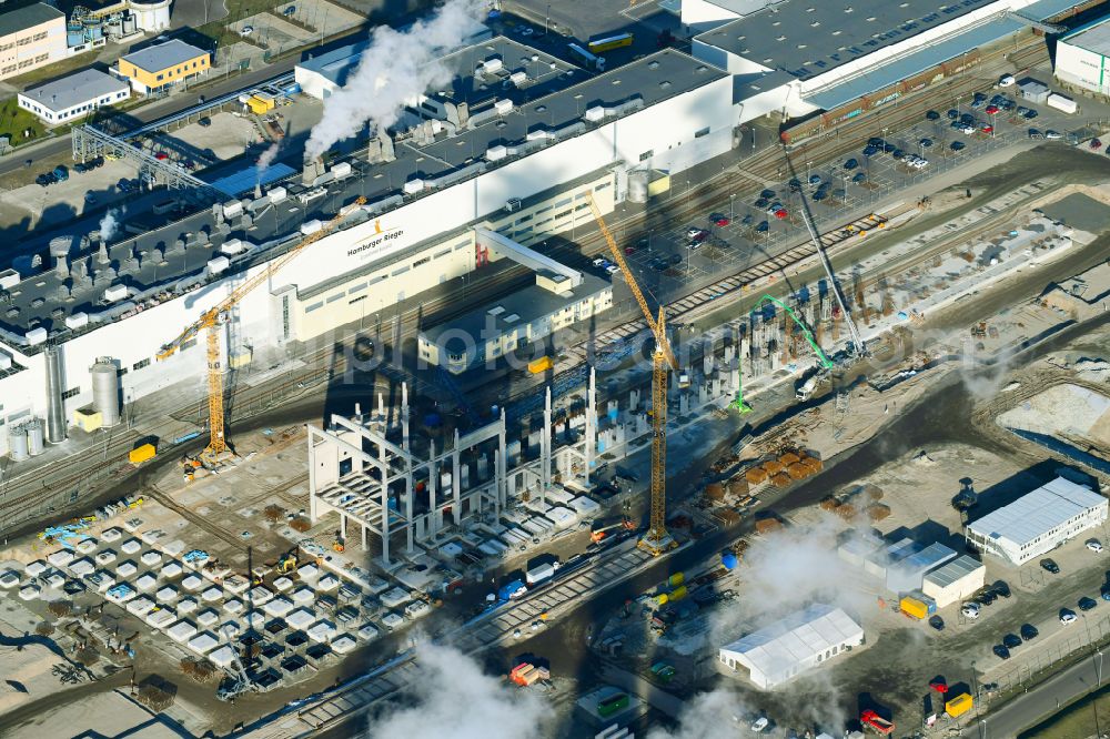 Spremberg from the bird's eye view: Construction site on building and production halls on the premises of Hamburger Rieger GmbH An der Heide in the district Trattendorf in Spremberg in the state Brandenburg, Germany