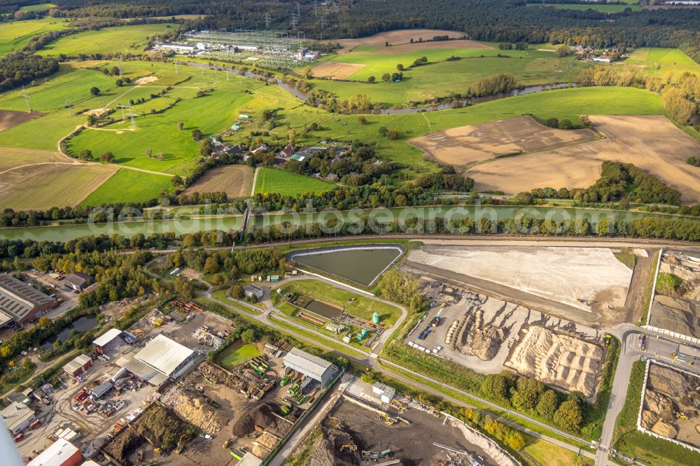 Hünxe from the bird's eye view: Construction site on building and production halls on the premises of HDB Recycling GmbH on street Emil-Fischer-Strasse in the district Bucholtwelmen in Huenxe in the state North Rhine-Westphalia, Germany