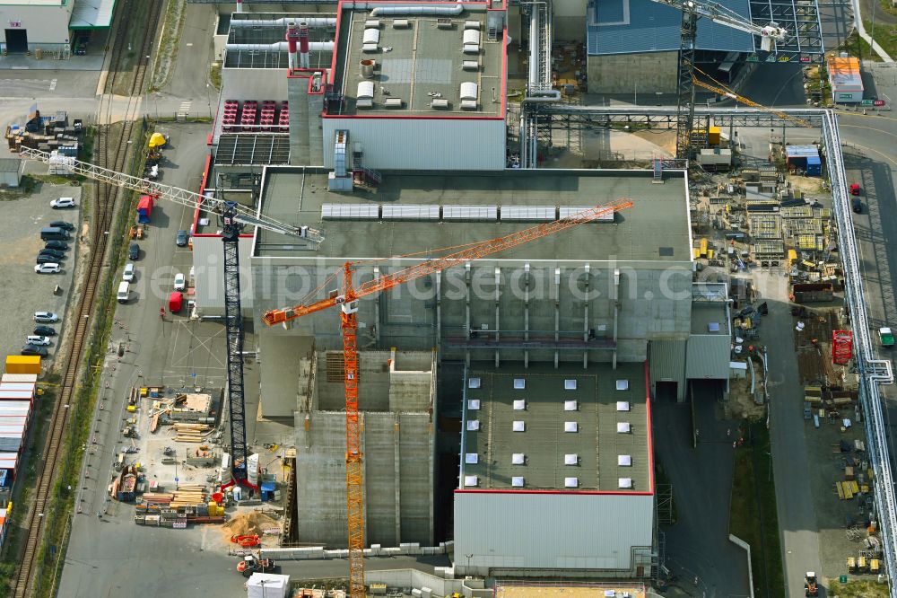 Spremberg from the bird's eye view: New construction site for a Wte - combined heat and power plant to expand the buildings and production halls on the factory premises of Spreerecycling GmbH & Co. KG on An der Heide Strasse A-Mitte in the district of Trattendorf in Spremberg in the state of Brandenburg, Germany