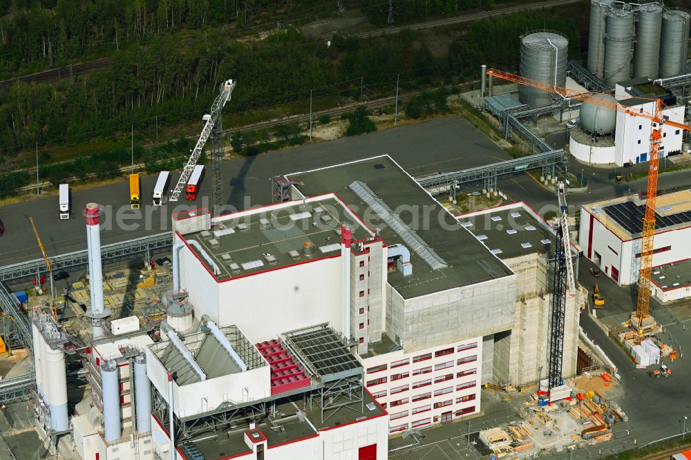 Spremberg from the bird's eye view: New construction site for a Wte - combined heat and power plant to expand the buildings and production halls on the factory premises of Spreerecycling GmbH & Co. KG on An der Heide Strasse A-Mitte in the district of Trattendorf in Spremberg in the state of Brandenburg, Germany