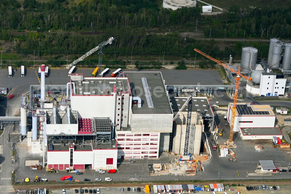 Aerial photograph Spremberg - New construction site for a Wte - combined heat and power plant to expand the buildings and production halls on the factory premises of Spreerecycling GmbH & Co. KG on An der Heide Strasse A-Mitte in the district of Trattendorf in Spremberg in the state of Brandenburg, Germany