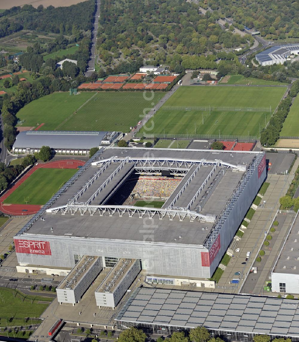 Düsseldorf from the bird's eye view: Blick auf die ESPRIT arena (bis Juni 2009 LTU arena) in Düsseldorf. Die Multifunktionsarena wurde am Ort des alten Rheinstadions errichtet und 2005 eröffnet. Das Stadion hat eine Kapazität von 54.600 Plätzen. View of the ESPRIT arena (until June 2009 LTU Arena) in Dusseldorf. The multi-purpose arena was built at the site of the old Rhine Stadium and opened in 2005. The stadium has a capacity of 54 600 seats.