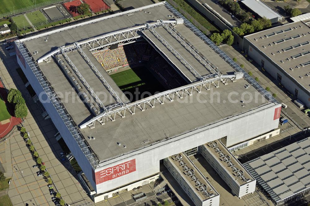 Düsseldorf from the bird's eye view: Blick auf die ESPRIT arena (bis Juni 2009 LTU arena) in Düsseldorf. Die Multifunktionsarena wurde am Ort des alten Rheinstadions errichtet und 2005 eröffnet. Das Stadion hat eine Kapazität von 54.600 Plätzen. View of the ESPRIT arena (until June 2009 LTU Arena) in Dusseldorf. The multi-purpose arena was built at the site of the old Rhine Stadium and opened in 2005. The stadium has a capacity of 54 600 seats.