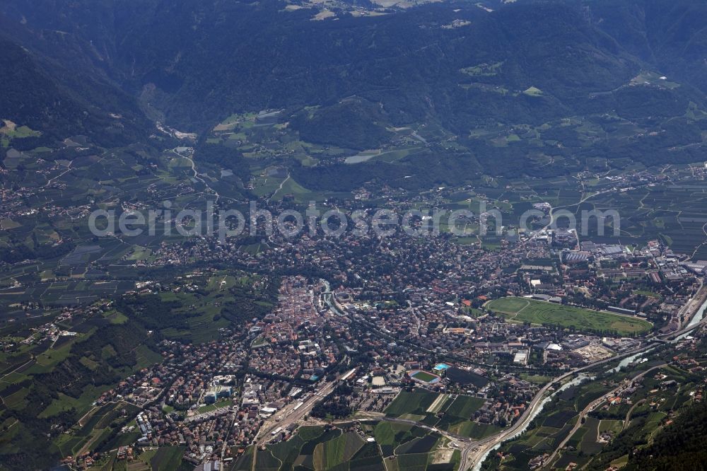 Aerial image Meran - View from Merano into the Etschtal in Merano, Italy. The Etsch (Italian Adige) flows through the entire valley and later opens into the Mediterranean Sea at Chioggia