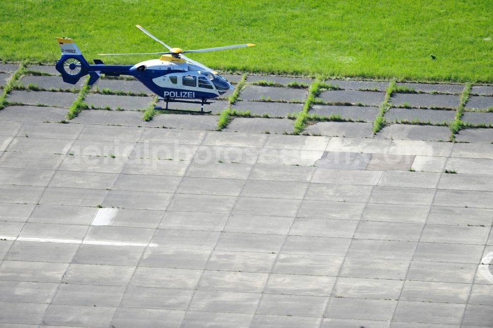 Werneuchen from above - View one just above the runway / runway of the airfield Werneuchen floating Eurocopter with the registration D-HBBZ the Federal Police