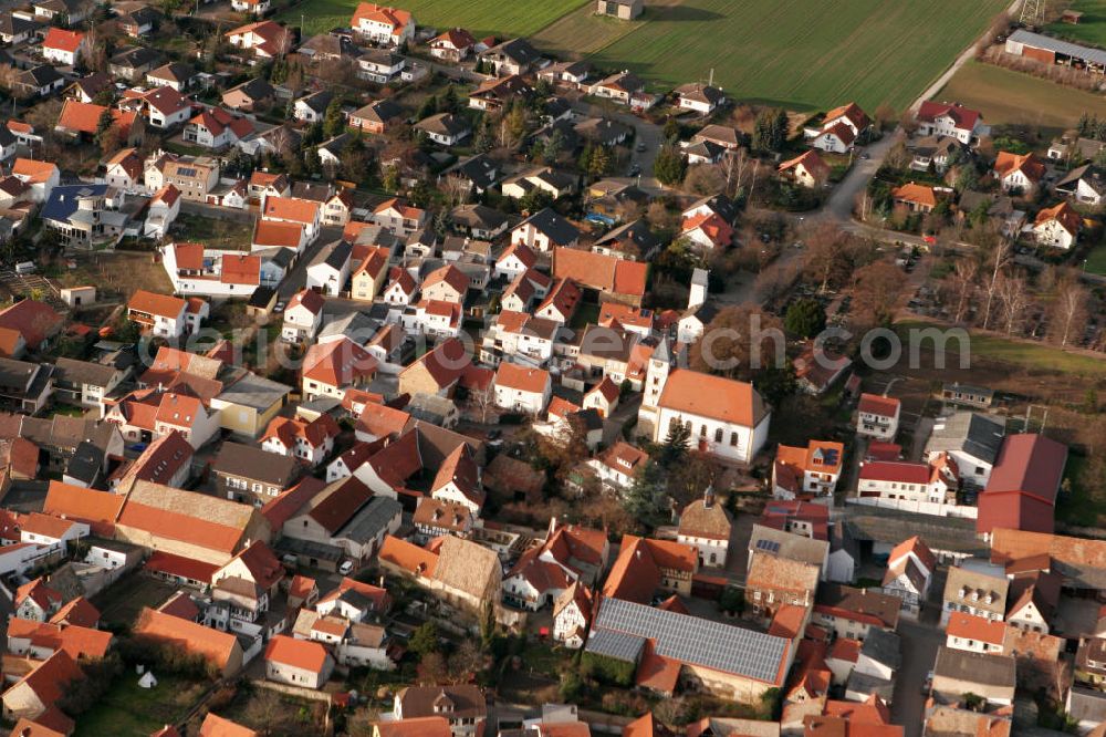 Aerial image Albig - Sicht auf die Evangelische Liebfrauenkirche in Albig im Landkreis Alzey-Worms in Rheinland-Pfalz. Die Kirche wurde um 650 erbaut und 962 erstmals urkundlich erwähnt. Sie war die Taufkirche der Hildegard von Bingen. View to the Evangelistic Church of Albig in the administrative district Alzey-Worms of Rhineland-Palatinate.