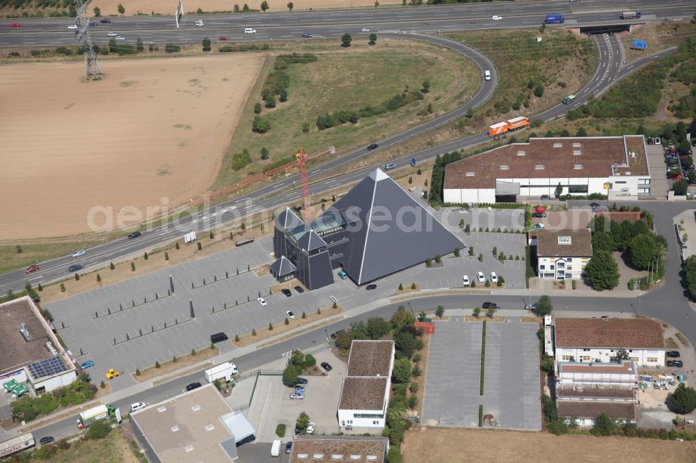 Mainz from above - Eventlocation in Mainz in the state Rhineland-Palatinate. Eventpyramide in Mainz in Rhineland-Palatinate. In the industrial area of Mainz Hechtsheim next to the A60 was created in a ten year construction period an Eventlocation. The manager is the dentist Dr. Harald Geiling, Mainz, who built the project essentially in own contribution with some helpers