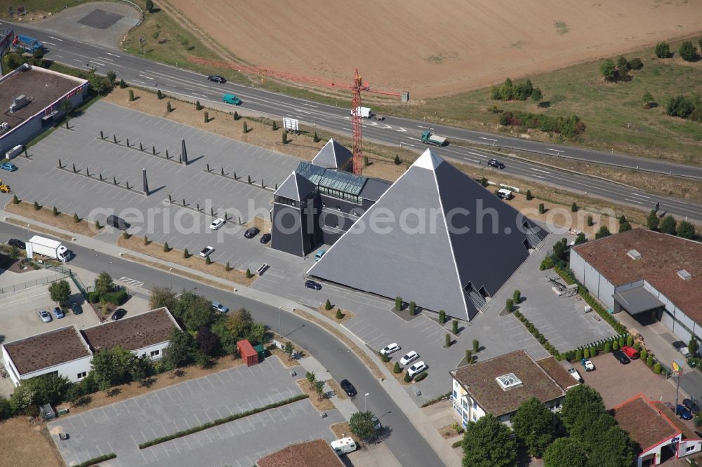 Mainz from the bird's eye view: Eventlocation in Mainz in the state Rhineland-Palatinate. Eventpyramide in Mainz in Rhineland-Palatinate. In the industrial area of Mainz Hechtsheim next to the A60 was created in a ten year construction period an Eventlocation. The manager is the dentist Dr. Harald Geiling, Mainz, who built the project essentially in own contribution with some helpers