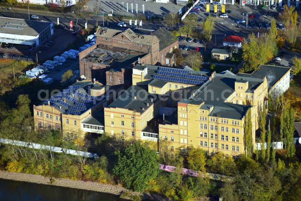 Aerial image Lutherstadt Wittenberg - View of a factory and office building on the banks of the Elbe in Saxony-Anhalt