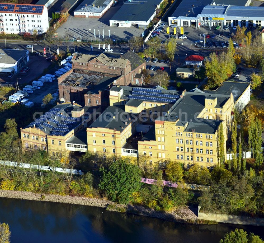 Aerial photograph Lutherstadt Wittenberg - View of a factory and office building on the banks of the Elbe in Saxony-Anhalt