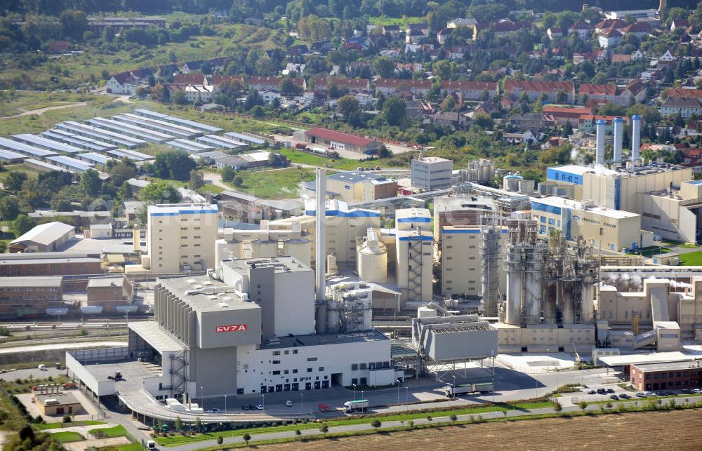 Staßfurt from above - Factory premises of the waste incinerating facility of the EVZA GmbH and the Sodawerk Staßfurt in Saxony-Anhalt. EVZA is a company for the treatment of residual waste for energy generation, e.g. for steam and electricity production. The Sodawerk for the manufaturing of soda is operated by the Sodawerk Staßfurt GmbH & Co. KG