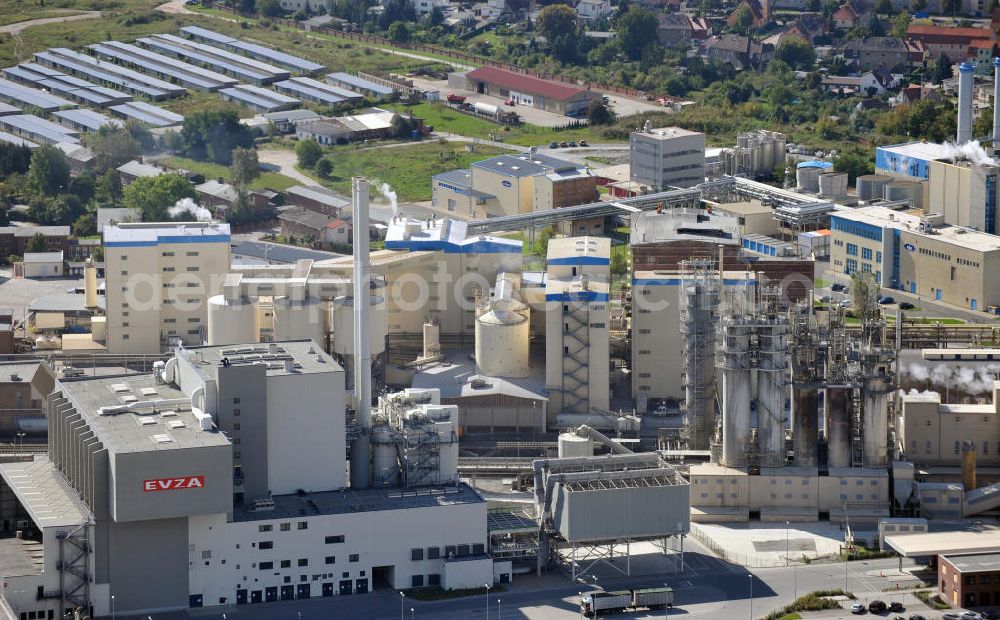 Aerial image Staßfurt - Factory premises of the waste incinerating facility of the EVZA GmbH and the Sodawerk Staßfurt in Saxony-Anhalt. EVZA is a company for the treatment of residual waste for energy generation, e.g. for steam and electricity production. The Sodawerk for the manufaturing of soda is operated by the Sodawerk Staßfurt GmbH & Co. KG