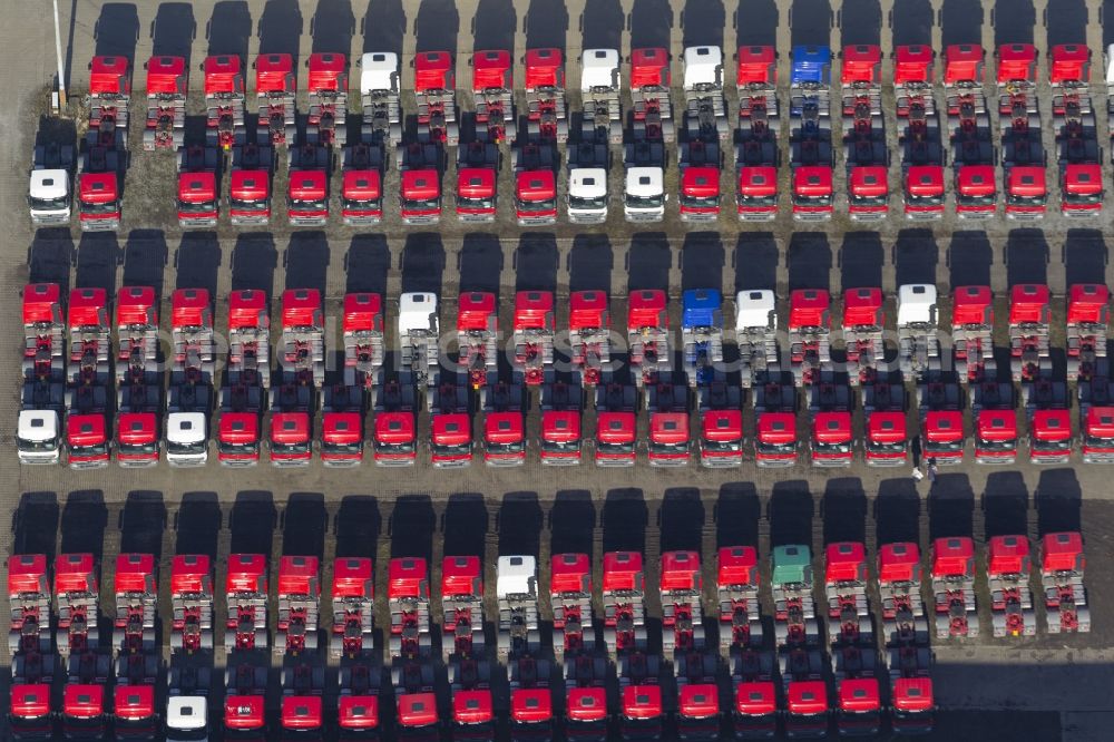 Herten from the bird's eye view: Brand new Mercedes truck tractors on the factory park in the grounds Recklinghausen Hochlarmark of the former mine Recklinghausen in Herten in North Rhine-Westphalia NRW