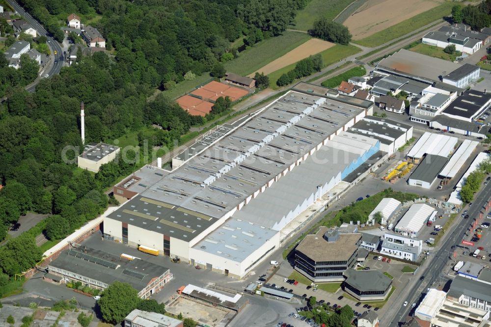 Menden (Sauerland) from above - Factory building of Ewald Rostek GmbH in Menden (Sauerland) in the state North Rhine-Westphalia. The facilities are located in an industrial area in the North of the town centre