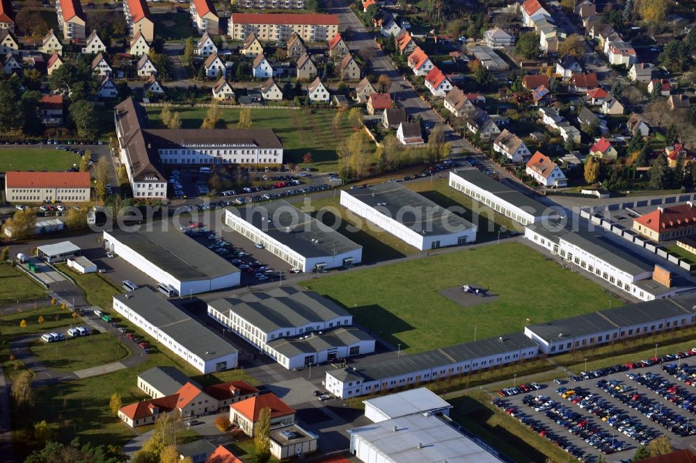 Oranienburg from above - Overlooking the grounds of the Police College of the State of Brandenburg ( FHPol ) at Bernauer Strasse and the former SS administration building for the Inspectorate of the Concentration Camps in Oranienburg. The former SS administration building at the Heinrich Gruber Square served the Nazis as the site of the bureaucratic planning and coordination of the conditions in many concentration camps. Today the premises are used by the Brandenburg Memorials Foundation and the IRS Oranienburg