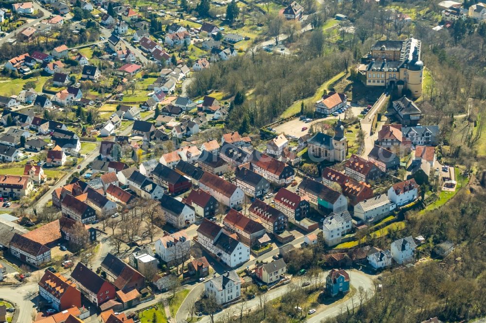 Aerial image Bad Wildungen - Half-timbered house and multi-family house- residential area in the old town area and inner city center on Schlossstrasse in Bad Wildungen in the state Hesse, Germany