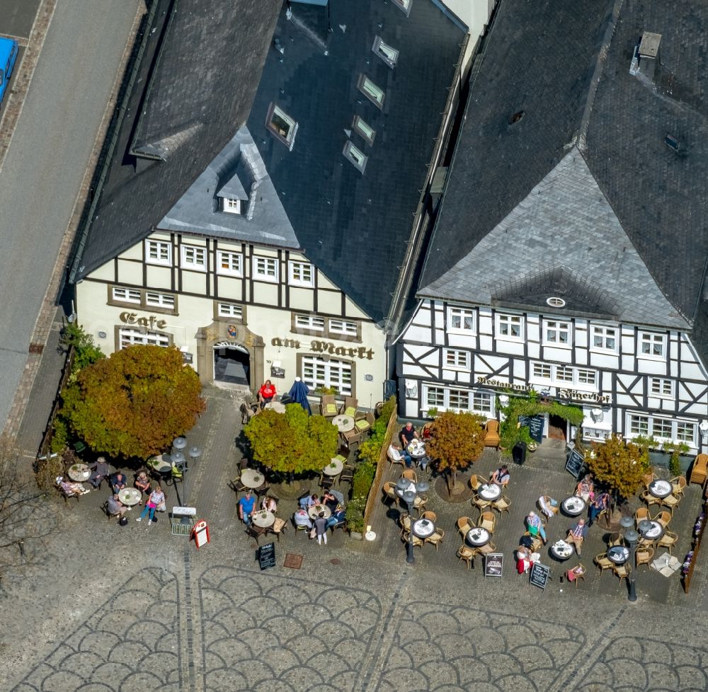 Aerial image Brilon - Tables and benches of open-air restaurants Restaurant Der Jaegerhof Am Markt in Brilon in the state North Rhine-Westphalia