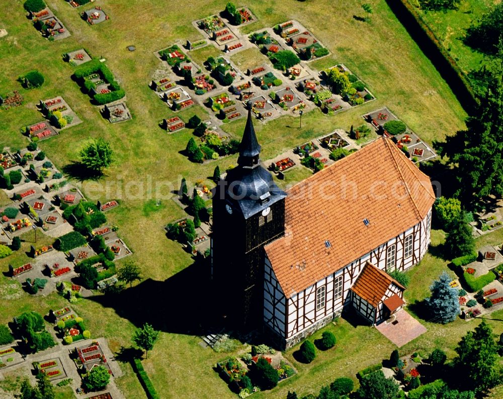Aerial photograph Schlepzig - The timber-framed church with a cemetery in Schlepzig in Brandenburg