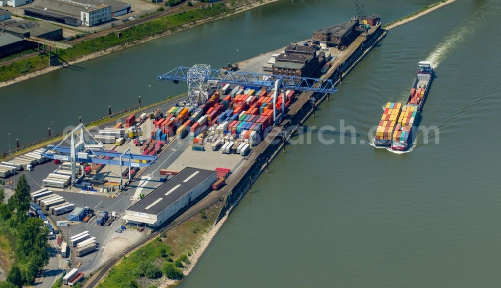 Duisburg from above - Sailing container ship at the Krefelder Container Terminal in Duisburg in the state North Rhine-Westphalia