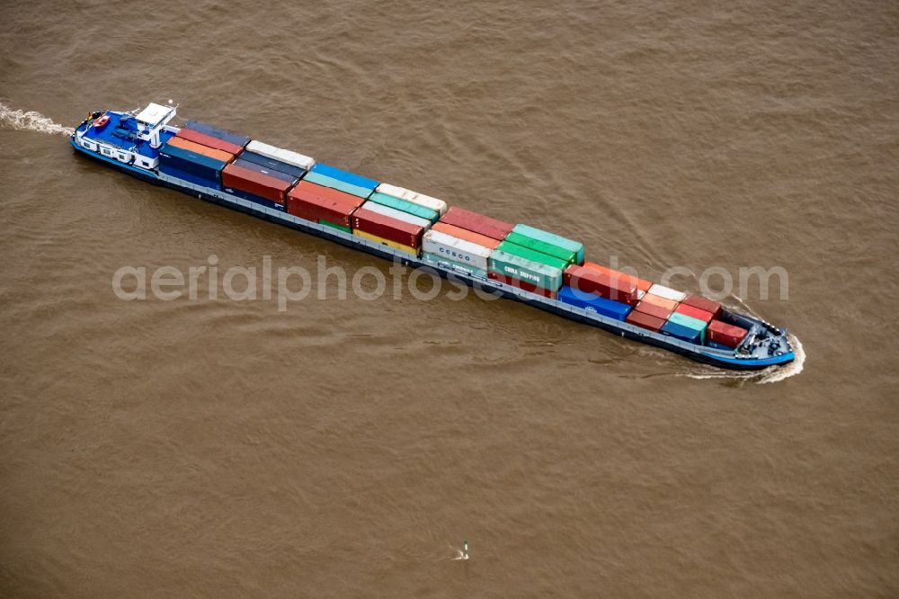 Wesel from above - Sailing container ship on Rhine in Wesel in the state North Rhine-Westphalia, Germany