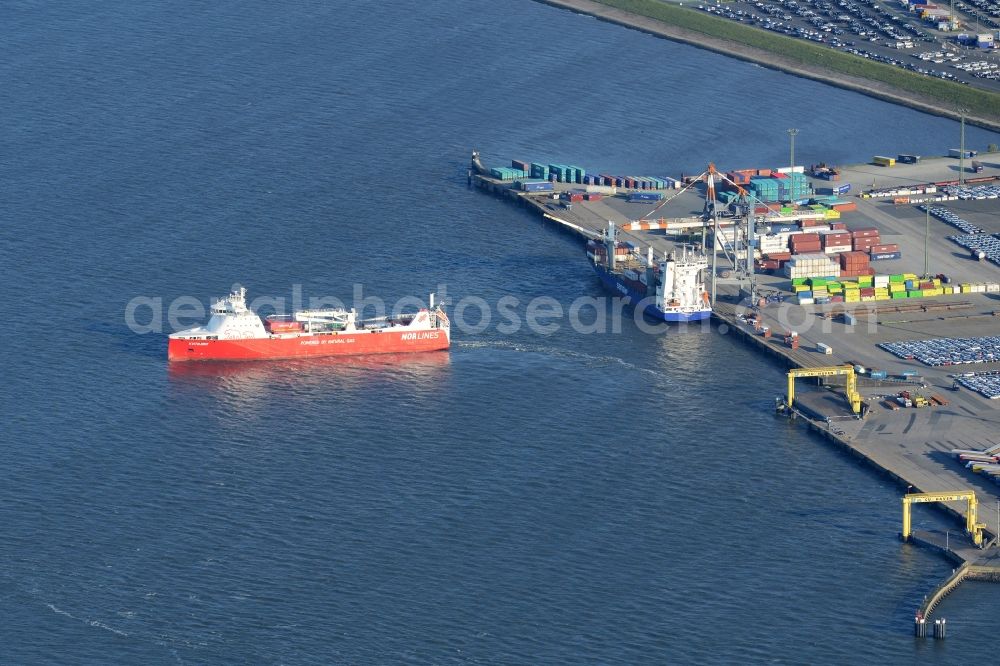 Cuxhaven from the bird's eye view: Sailing container ship of the company NorLines on the river Elbe near the port area in Cuxhaven in the state Lower Saxony