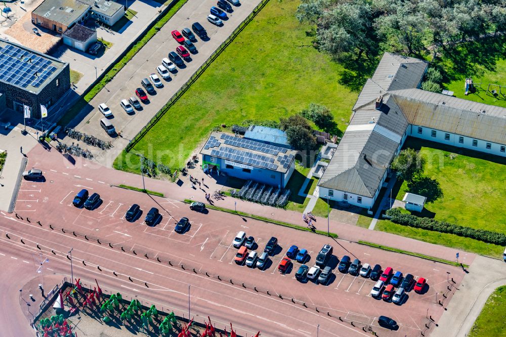 Aerial photograph Norderney - Bicycle rental Charlys Fahrradverleih at the port of Norderney in the state Lower Saxony, Germany