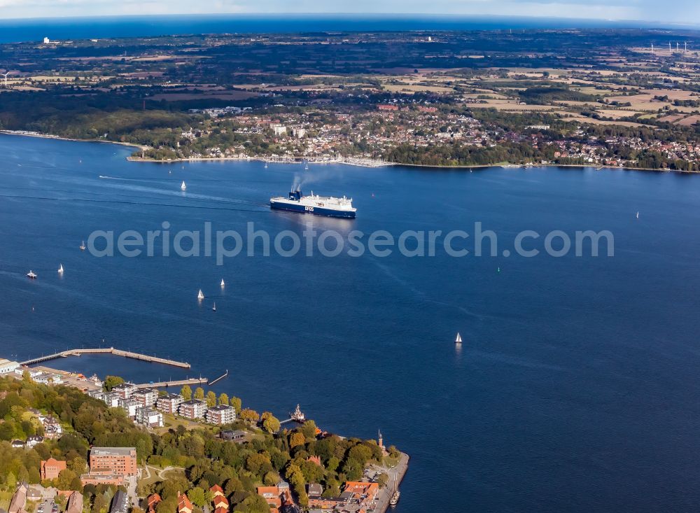 Aerial image Heikendorf - First call of the ferry AURA SEAWAYS in the Kiel Fjord in Kiel in the state Schleswig-Holstein, Germany. The 230-metre-long RoPax ferry operated by the DFDS shipping company runs scheduled services across the Baltic Sea from Kiel to Klaipeda