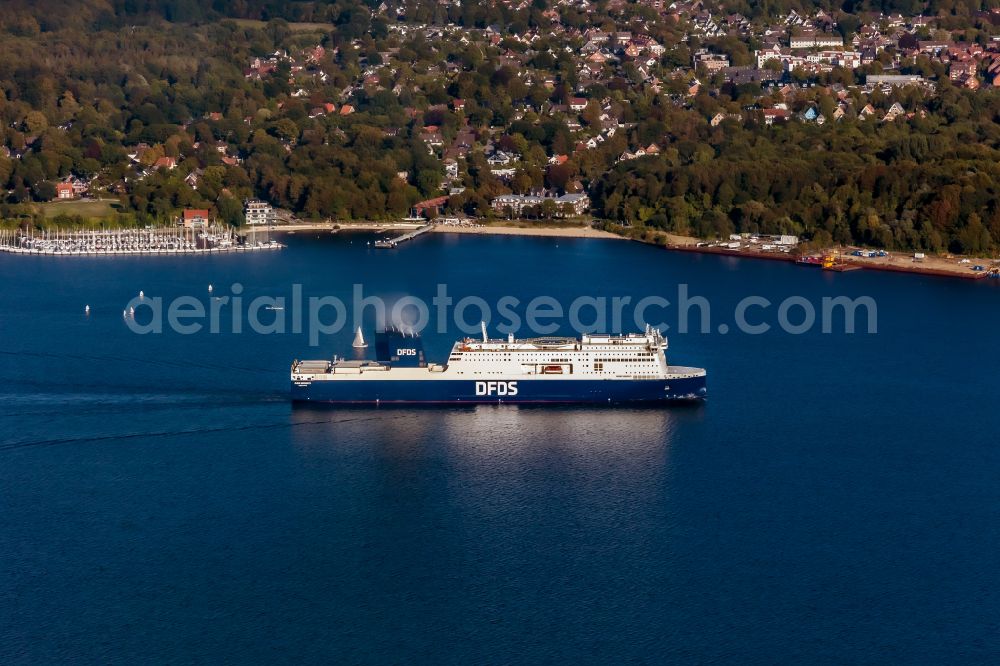 Kiel from above - First call of the ferry AURA SEAWAYS in the Kiel Fjord in Kiel in the state Schleswig-Holstein, Germany. The 230-meter-long RoPax ferry runs scheduled services across the Baltic Sea from Kiel to Klaipeda in Lithuania