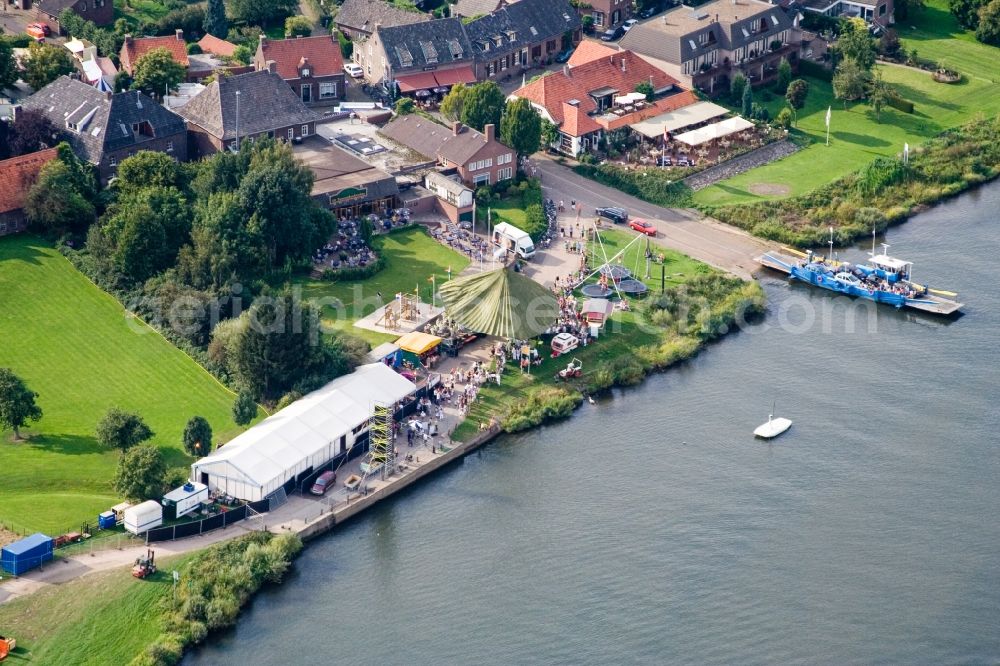 Broekhuizen from above - Ride a ferry ship of Autoveer Broekhuizen - Arcen about the Maas in Broekhuizen in Limburg, Netherlands