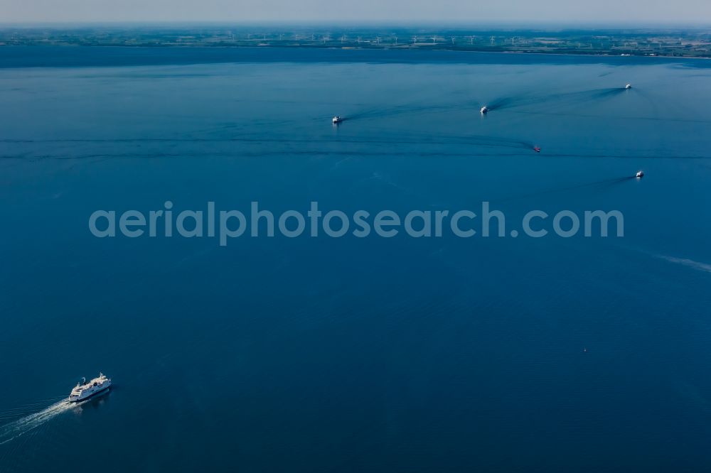 Aerial photograph Rödby Sogn - Driving a ferry on the Fehmarnbelt in Rodby Sogn in Denmark. Five ferries connect the German island of Fehmarn with the Danish island of Lolland in shuttle traffic