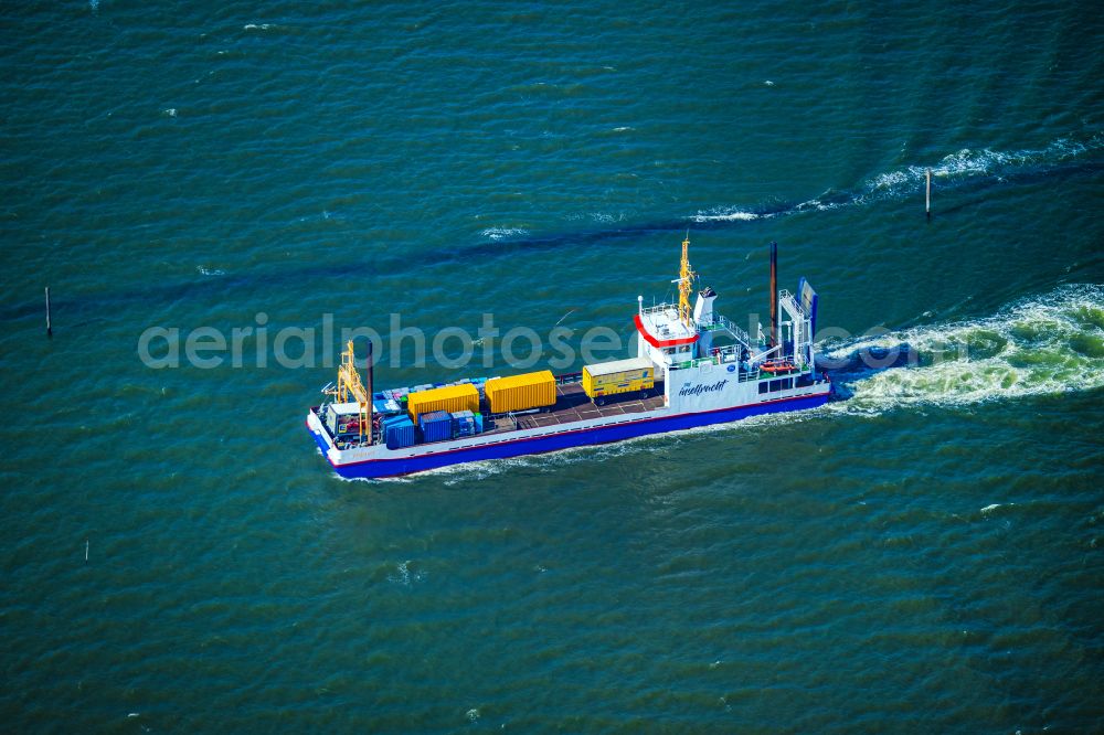 Aerial image Juist - Ride a ferry ship Frisia Inselfacht VIII on street Am Hafen in Juist in the state Lower Saxony, Germany