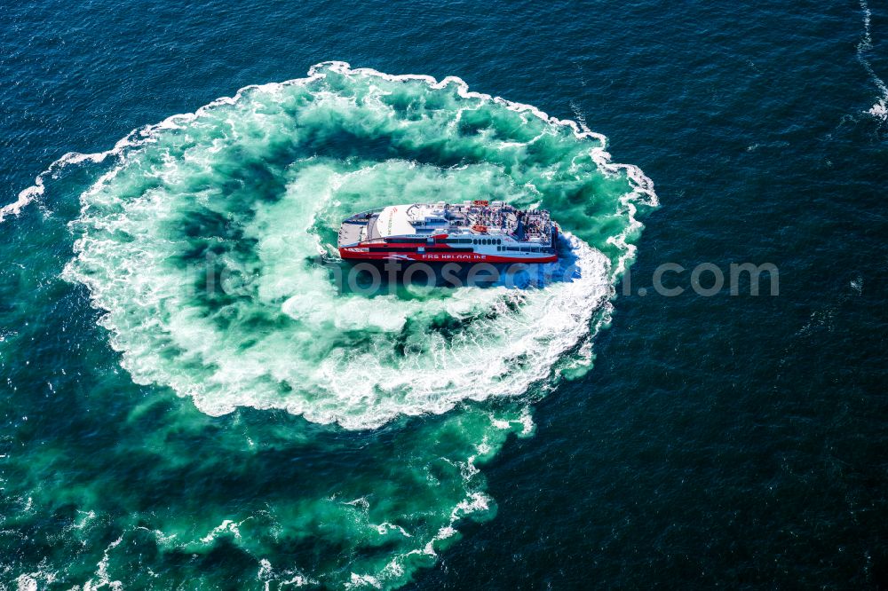 Aerial photograph Helgoland - Trip of a ferry ship FRS Halunder Jet in Heligoland in the state Schleswig-Holstein, Germany