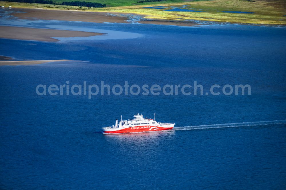 List from above - Ride a ferry ship Limassol in List at the island Sylt in the state Schleswig-Holstein, Germany