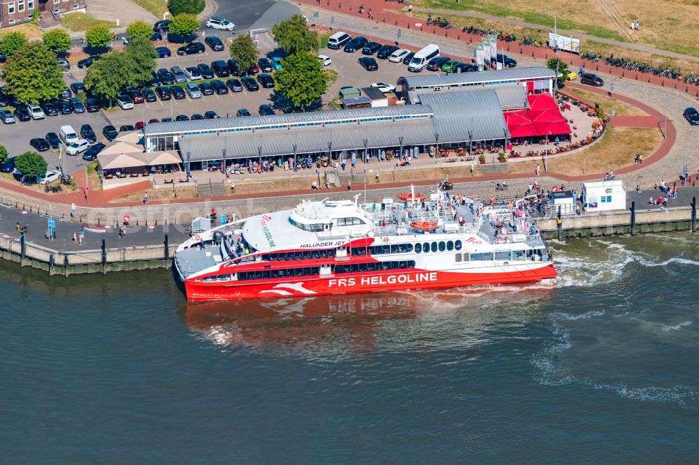 Aerial image Cuxhaven - Travel of a ferry ship Katamaran Halunder Jet der FRS Reederei in Cuxhaven habour in the state Lower Saxony, Germany