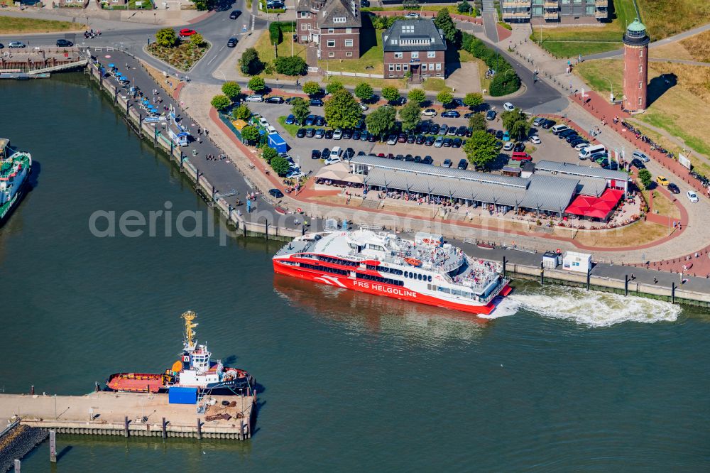 Aerial image Cuxhaven - Travel of a ferry ship Katamaran Halunder Jet der FRS Reederei in Cuxhaven habour in the state Lower Saxony, Germany